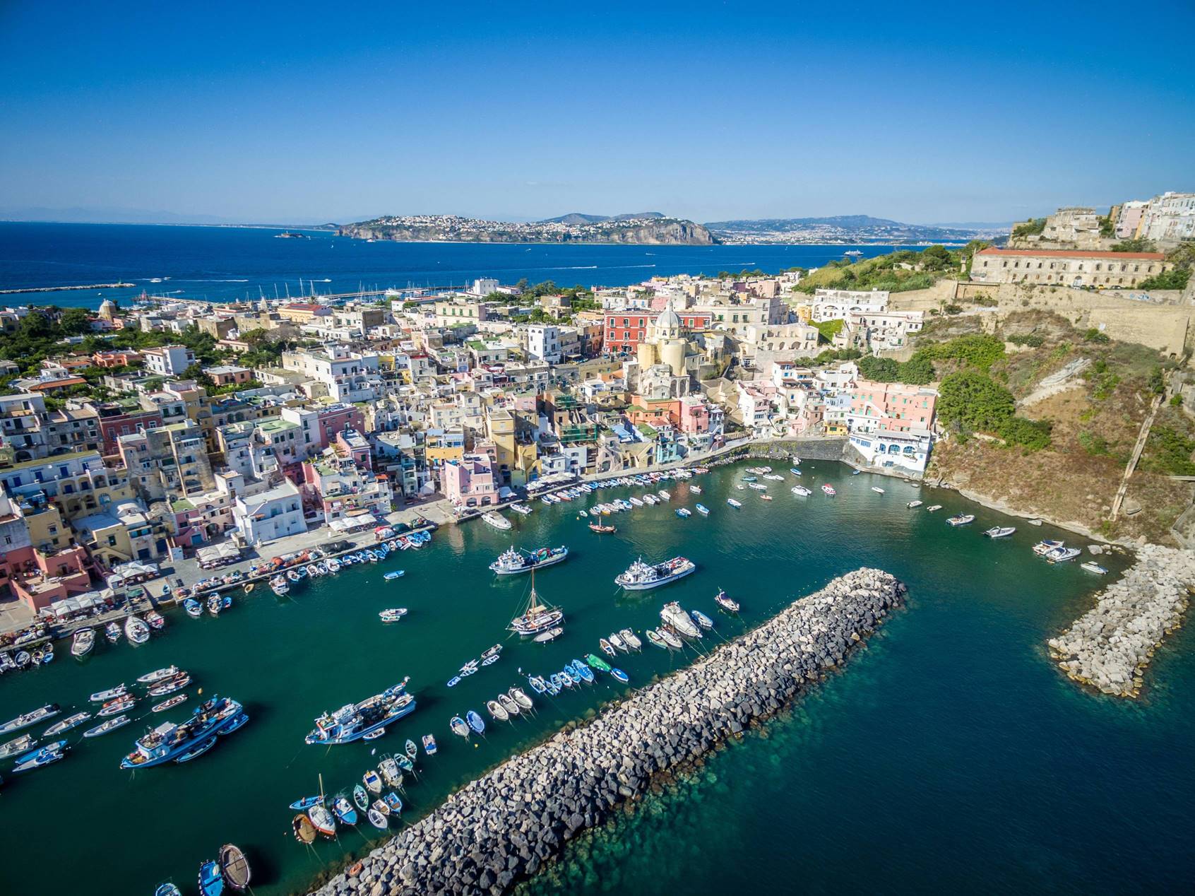 procida-118-stock-photo-aerial-view-of-procida-naples-italy-la-corricella-harbour-469351202-min.jpg